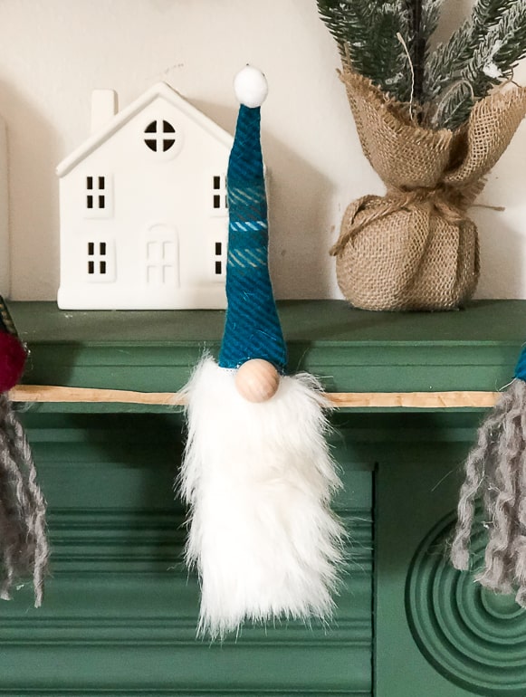 This easy DIY Christmas Gnome Garland will add a little whimsy to your Christmas decor this year.