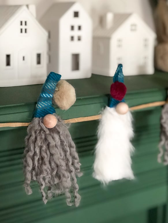 This easy DIY Christmas Gnome Garland will add a little whimsy to your Christmas decor this year. 