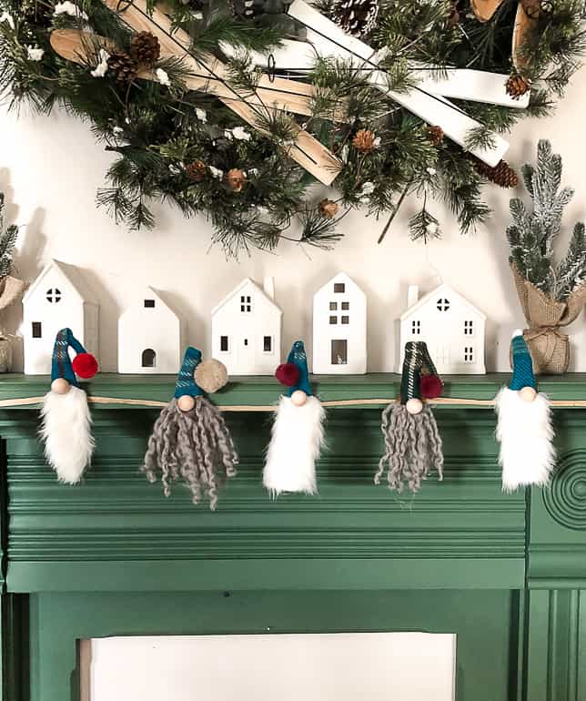 This easy DIY Christmas Gnome Garland will add a little whimsy to your Christmas decor this year.