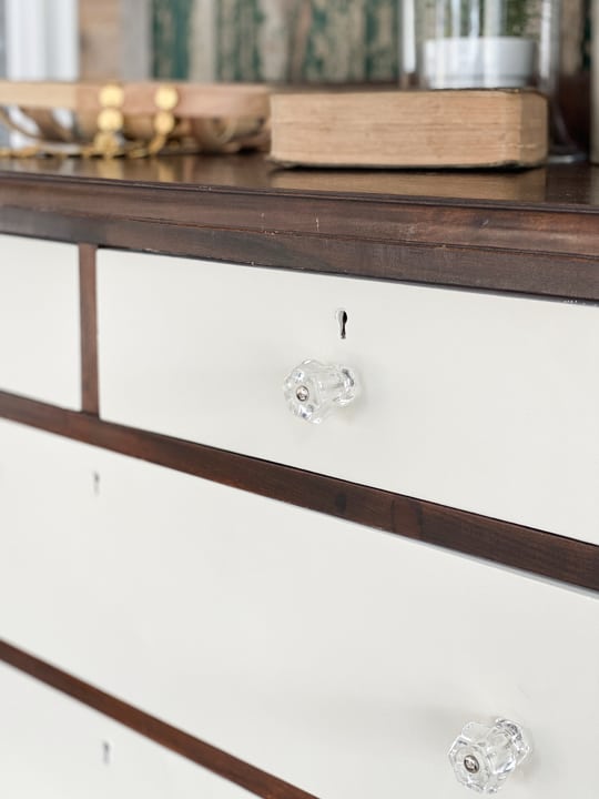 This tutorial teaches how to create a Two-Toned Painted Dresser Makeover with a few supplies and a little elbow grease.