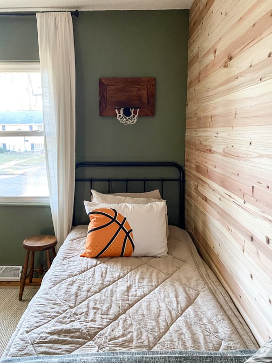 This Teen Boy's Bedroom Makeover is rustic, handsome, sophisticated and sleek. Find all the sources and info to create something similar for your teenager!