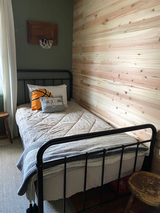 This Teen Boy's Bedroom Makeover is rustic, handsome, sophisticated and sleek. Find all the sources and info to create something similar for your teenager!