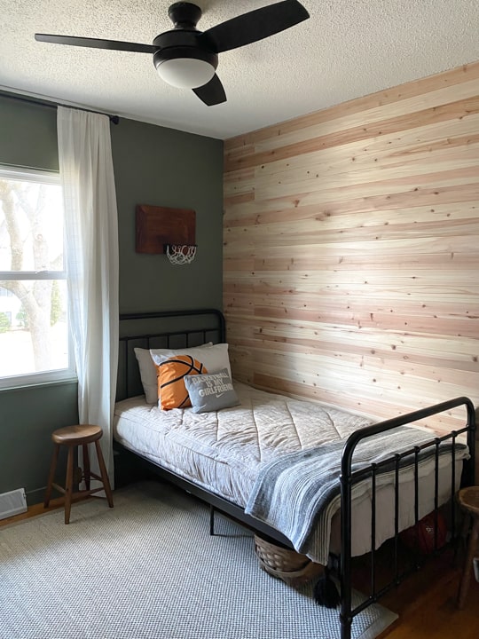 This Teen Boy's Bedroom Makeover is rustic, handsome, sophisticated and sleek. Find all the sources and info to create something similar for your teenager!
