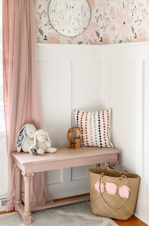 An old piano bench that called for a Pretty in Pink Bench Makeover to highlight the details on the legs and make it beautiful again.