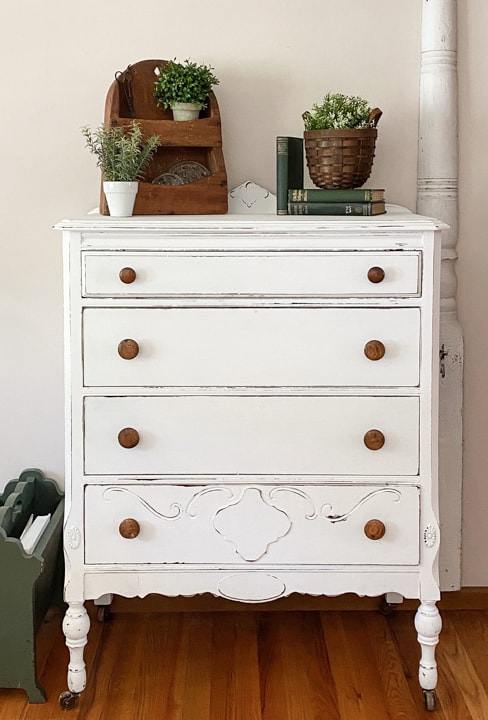 This Dresser Makeover With White Paint & BOSS was an easy transformation that made this outdated dresser pretty again in just a few steps.