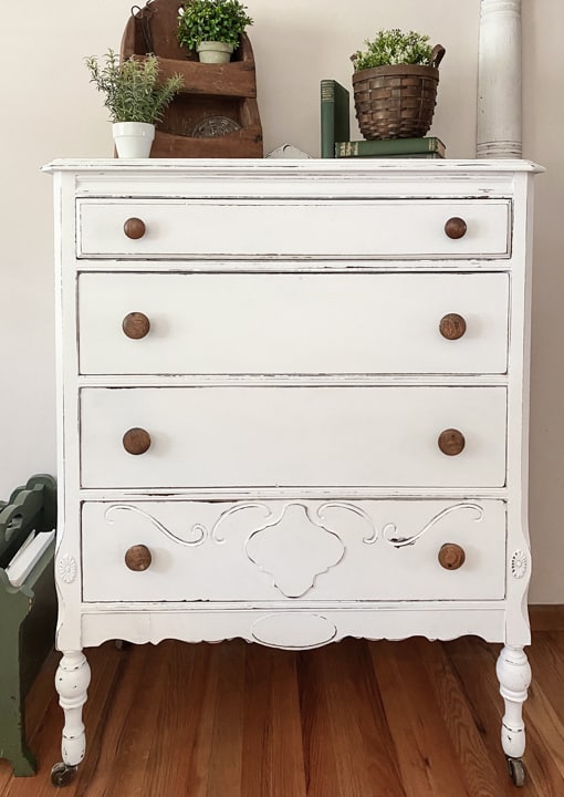 This Dresser Makeover With White Paint & BOSS was an easy transformation that made this outdated dresser pretty again in just a few steps.