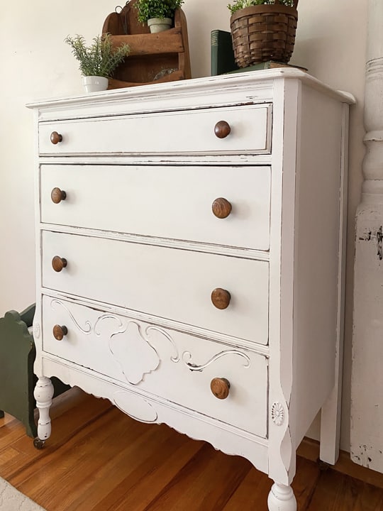 This Dresser Makeover With White Paint & BOSS was an easy transformation that made this outdated dresser pretty again in just a few steps.