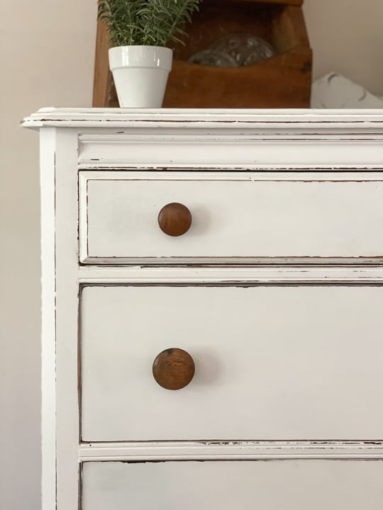 This Dresser Makeover With White Paint & BOSS was an easy transformation that made this outdated dresser pretty again in just a few steps.