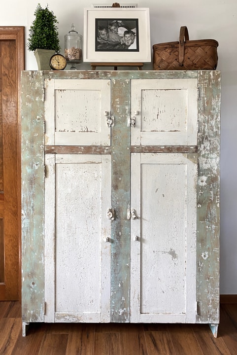 This DIY chippy cabinet was a free find that has added so much character, charm and storage to my home office!