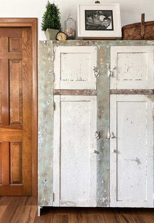 This DIY chippy cabinet was a free find that has added so much character, charm and storage to my home office!