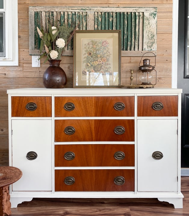 Buffets are a versatile piece of furniture and this creamy white boho buffet makeover turned a boring piece into a boho show stopper!