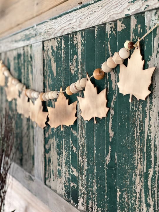 This DIY Dollar Store Fall Garland Craft could not be any easier and the outcome looks like you spent a lot of time and/or money on it.