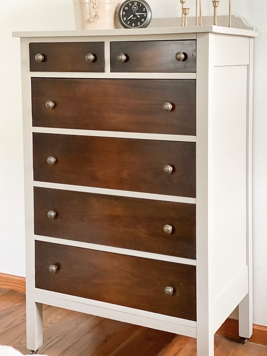 This DIY Neutral Dresser Makeover was done easily with some paint, a product that will make wood beautiful again and some new hardware!