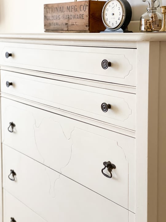 This DIY Tall Dresser Makeover was an easy way to transform an old dresser with a little TLC and paint on the outside and inside the drawers.