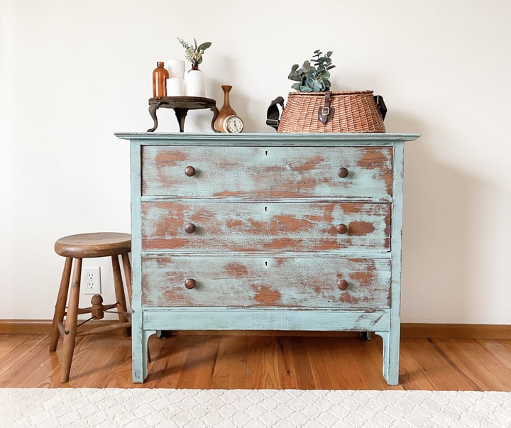 This Vintage Blue Dresser Makeover was done with some chalk mineral paint, a sander and a product to deepen the blue color.