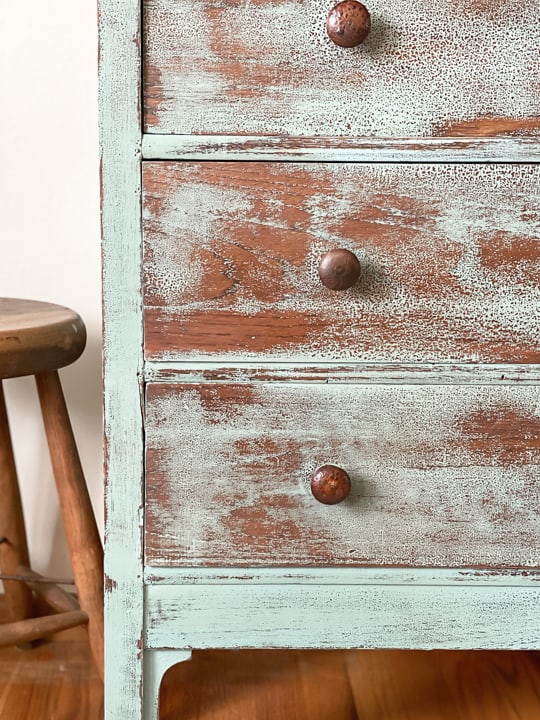 This Vintage Blue Dresser Makeover was done with some chalk mineral paint, a sander and a product to deepen the blue color.