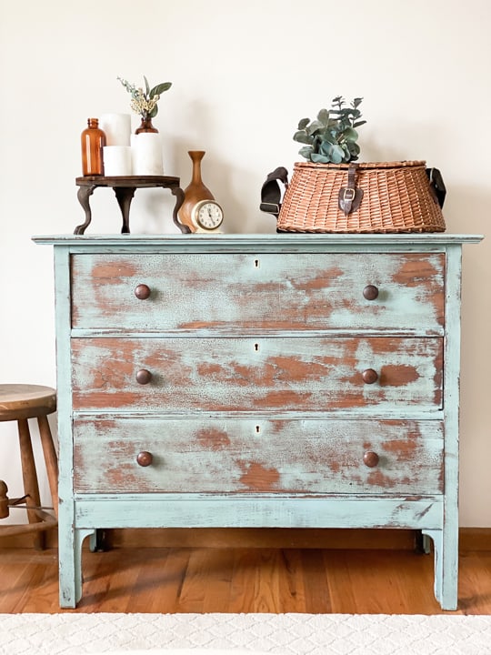 This Vintage Blue Dresser Makeover was done with some chalk mineral paint, a sander and a product to deepen the blue color.