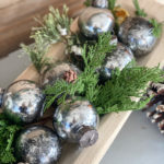 These DIY Mercury Glass Ornaments are easy to make, can be customized to any color you like and they are inexpensive!