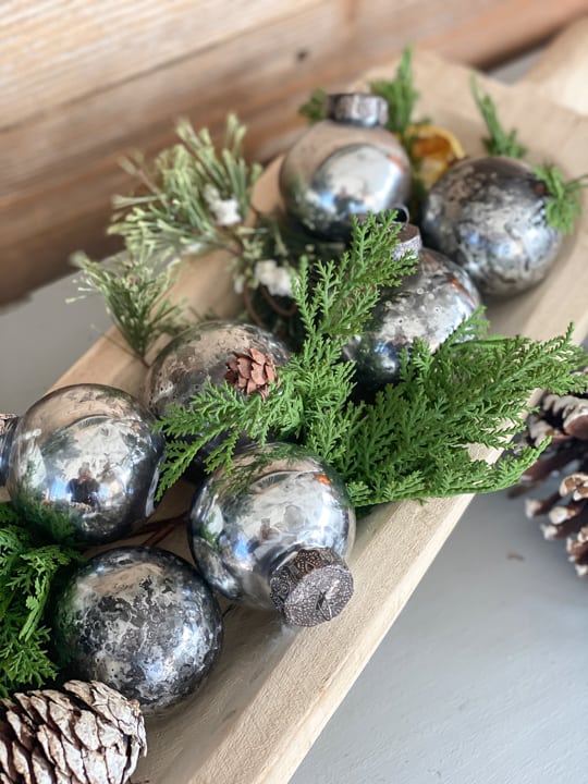 These DIY Mercury Glass Ornaments are easy to make, can be customized to any color you like and they are inexpensive!