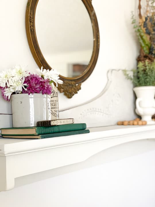 This Upcycled Mantel Shelf took a thrifted piece that was a part of a dresser and turned it into decor pieces to be used for years to come.