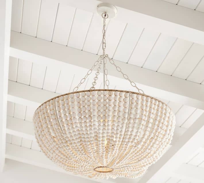 Wood bead chandeliers are so beautiful and they come in all shapes and sizes. This post will give you so many beautiful wood bead chandelier options for any space in your home.