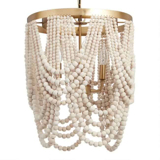 Wood bead chandeliers are so beautiful and they come in all shapes and sizes. This post will give you so many beautiful wood bead chandelier options for any space in your home.