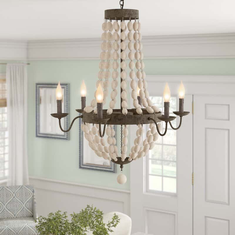 Wood bead chandeliers are so beautiful and they come in all shapes and sizes. This post will give you so many beautiful wood bead chandelier options for any space in your home.