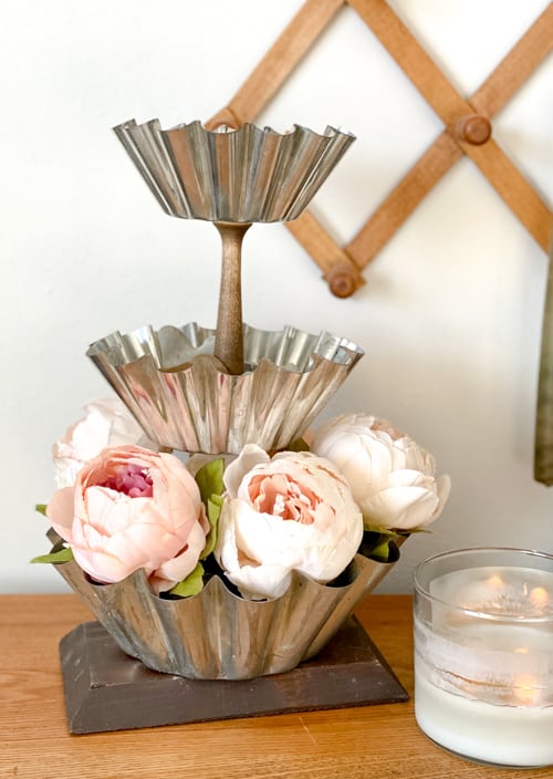This DIY Vintage Tiered Stand is a step by step tutorial on how to repurpose vintage mold pans into a functional tiered stand for your home.