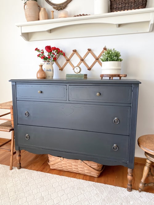 This painted black dresser makeover is a step-by-step tutorial showing how to take an old piece and make it beautiful and functional again.