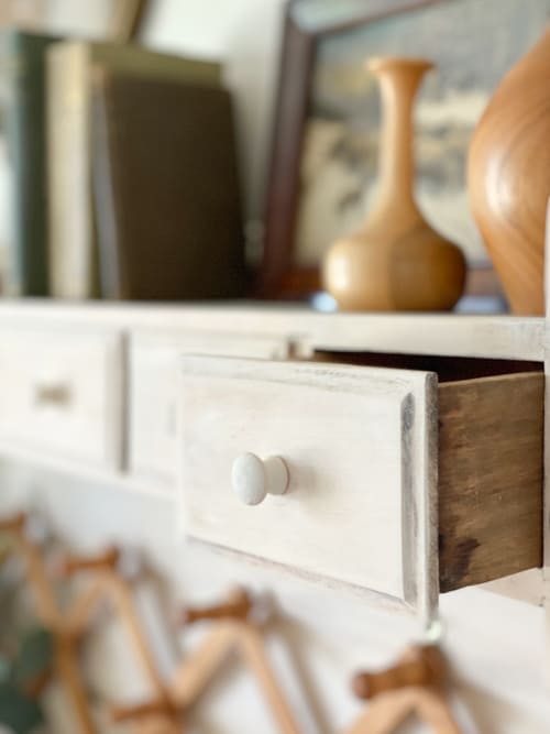 After stripping the orange patina and lightening the wood with an easy technique, this DIY wood wall organizer is now functional and pretty.