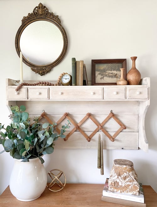 After stripping the orange patina and lightening the wood with an easy technique, this DIY wood wall organizer is now functional and pretty.