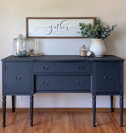 This Painted Black Buffet Makeover really made this thrift store buffet more regal and stunning with the combination of black and brass.