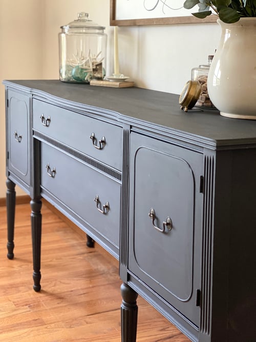 This Painted Black Buffet Makeover really made this thrift store buffet more regal and stunning with the combination of black and brass.