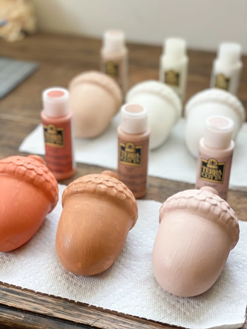 These DIY terra cotta acorns were very easy to make with two paint products and ceramic acorns from the dollar store.