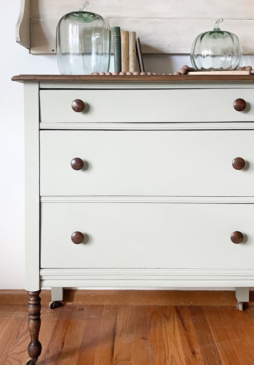 This sage green dresser makeover was made possible with a beautiful paint color and gel stain that turned it into a stunning piece again.