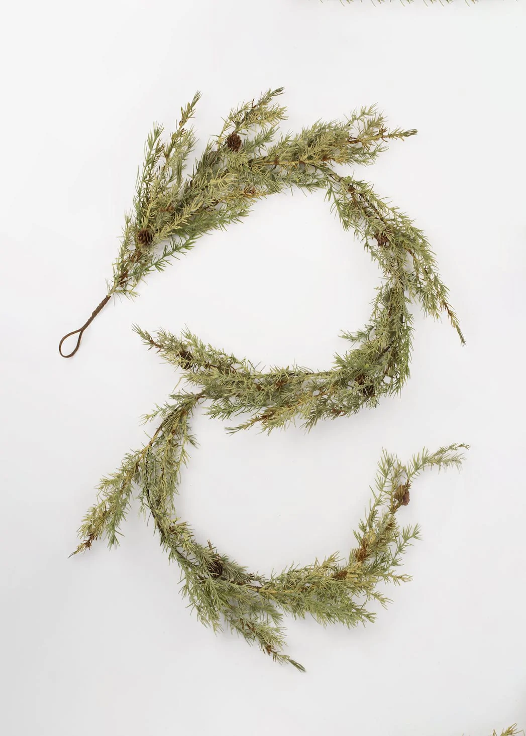 The best artificial garlands that give you the look of real greenery during the holidays and will never die so you can use them forever.