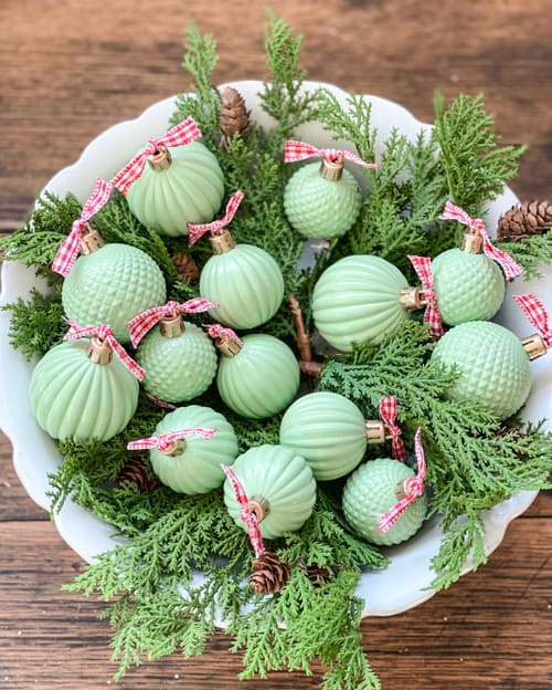 These DIY Jadeite Christmas Ornaments are so easy to make and give the look of vintage jadeite glassware that is so pretty and popular.