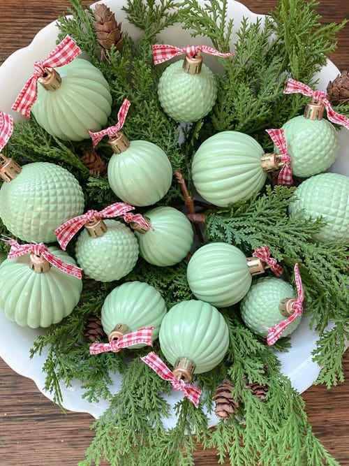 These DIY Jadeite Christmas Ornaments are so easy to make and give the look of vintage jadeite glassware that is so pretty and popular.