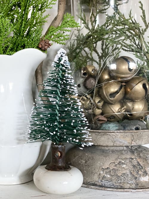 Small Christmas tree bases can be boring. These DIY Christmas Tree Bases add tons of charm and character to any small Christmas tree.