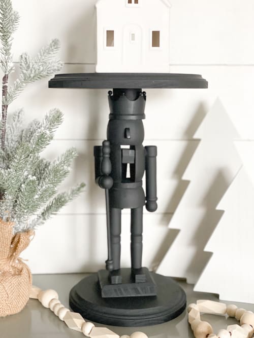 This Nutcracker Pedestal Decor is a twist to the traditional pedestal pieces for the holidays that is sure to bring smiles to your guests.