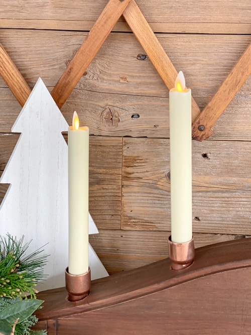 This DIY Wood Tapered Candle Holder is a unique way to display your favorite flameless tapered and pillar candles in your home.