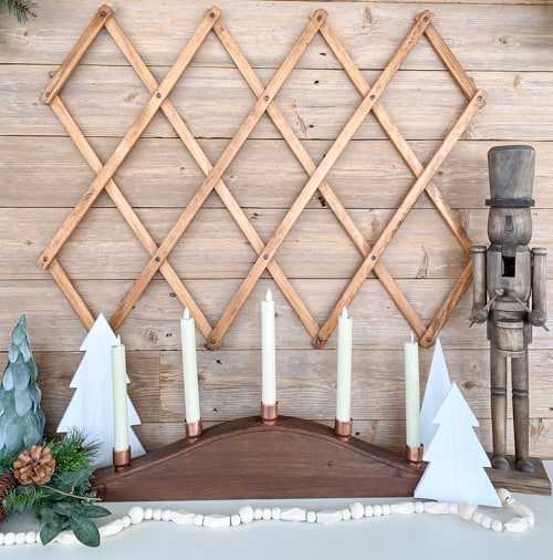 This DIY Wood Tapered Candle Holder is a unique way to display your favorite flameless tapered and pillar candles in your home.