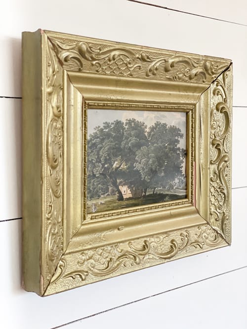 Don't have wall space to display large frames but can't pass them up when you find them? Learn how to make small frames from one large frame.