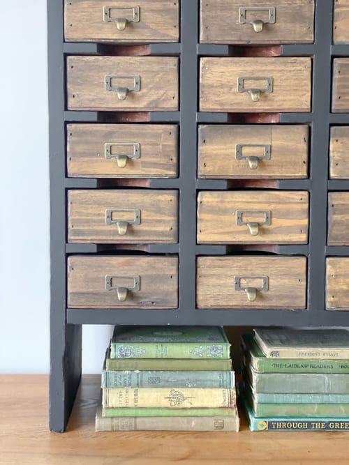 This DIY cubby makeover is a great example of how paint, stain, and scrap wood can turn an old piece into something beautiful again.