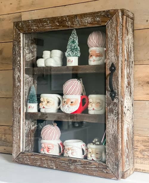 This glass cabinet makeover is an example of how thrift store finds can be made over to get the exact look you want in your home for less!