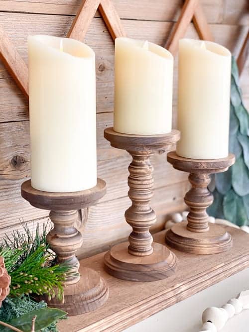 This DIY pillar candle holder is a great way to display your flameless pillar candles with just a few supplies from your local craft stores. 