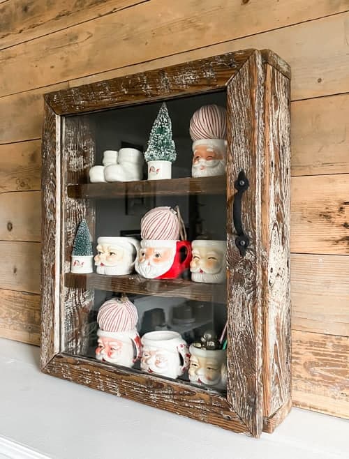 This glass cabinet makeover is an example of how thrift store finds can be made over to get the exact look you want in your home for less!