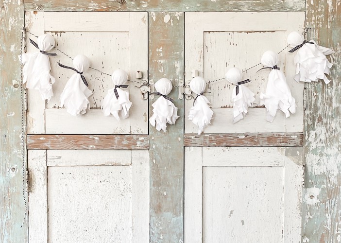This DIY Dollar Store Ghost Garland is an easy and inexpensive project that will bring some spooky Halloween flair to your party or decor.