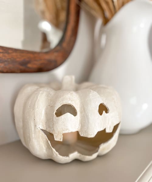 This DIY Jack-O-Lantern Tealight Holder is an easy project that will give you the look of an expensive holder for a fraction of the cost.