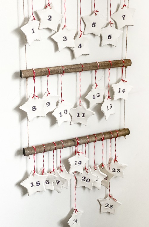 Discover how to make this DIY Scandinavian Advent Calendar with this step-by-step tutorial! It is easy and the kids can help you make it!